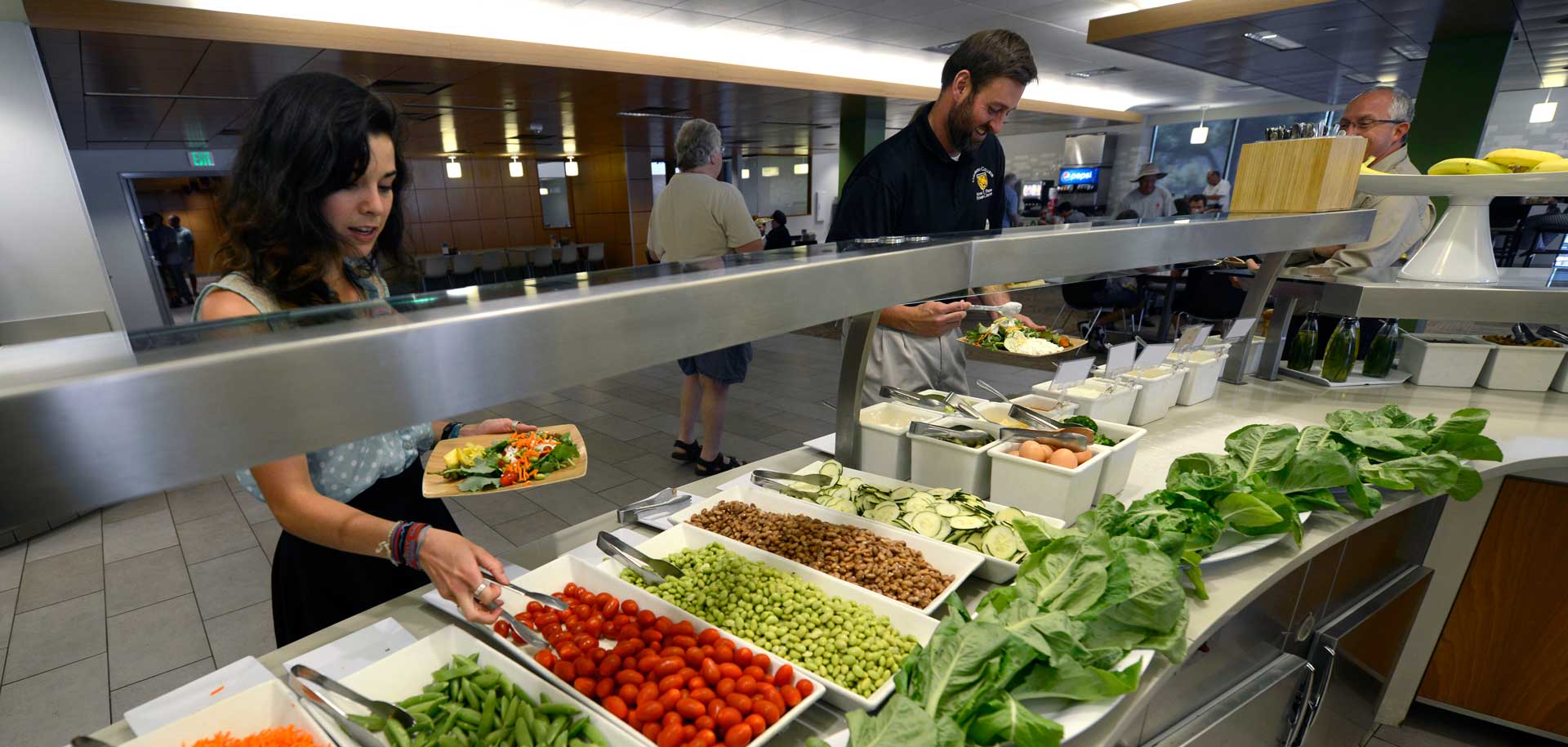 Students, faculty, staff and visitors flock to CC's cafeteria, Rastall Cafe. Some produce at the salad bar is harvested from the student garden. 