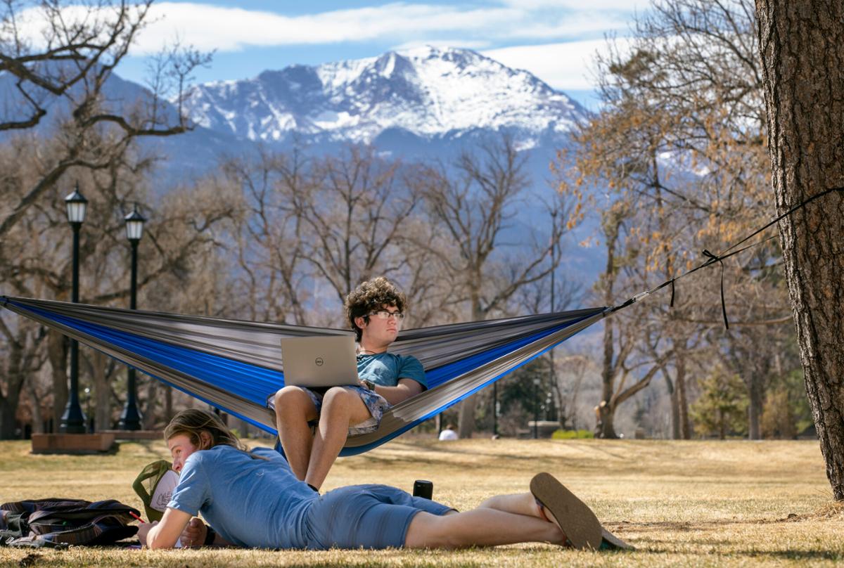 First year students, Sam Yolles, and Jesus Lara, right study on Tava Quad.