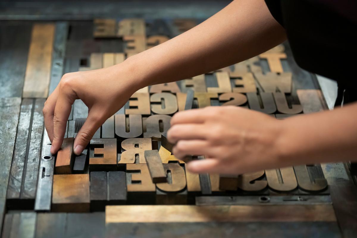 Book Arts and Letterpress (AS 110) class taught by Allison Milham on Tuesday, 7/12/22 in the Taylor Hall Press.