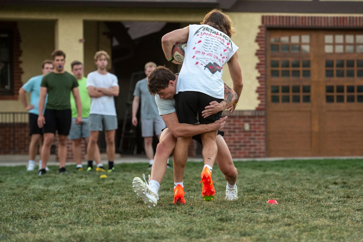 Chase Ressler '23, a member of The Colorado College club men’s rugby team practices on Washburn Field
