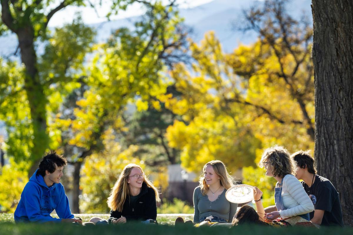 Students enjoy a warm fall afternoon in Tava Quad on Thursday, 10/18/22. Photo by Lonnie Timmons III / Colorado College.