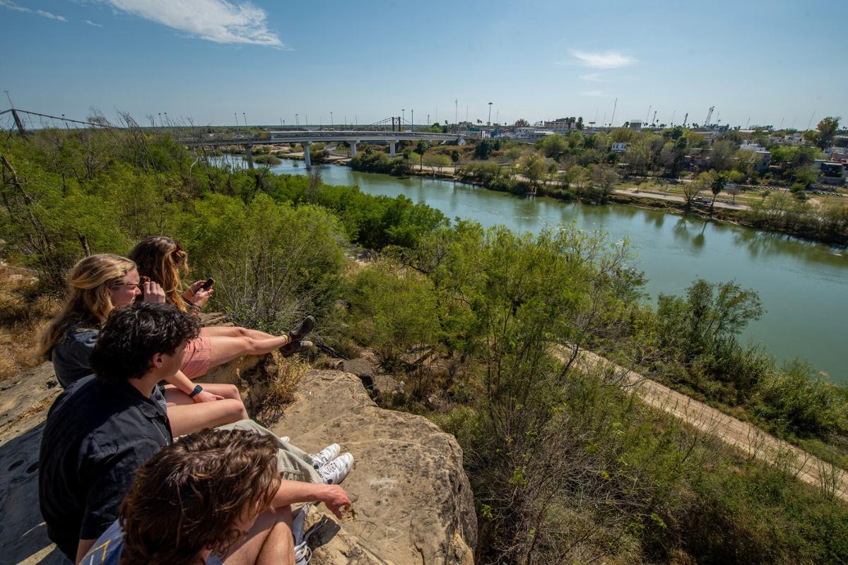 Students overlook the Rio Grande into Mexico in Professor Guerra’s Borders and Borderlands class as part of an immersive experience to learn about US-Mexico border relations, border culture, and border life on Saturday, February 18th, 2022. Photo by Erin Mullins ‘24 / Colorado College