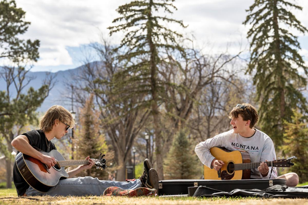 Left, Jake Davidson ’23, Sam Johnson ’25, practice for an upcoming bluegrass concert