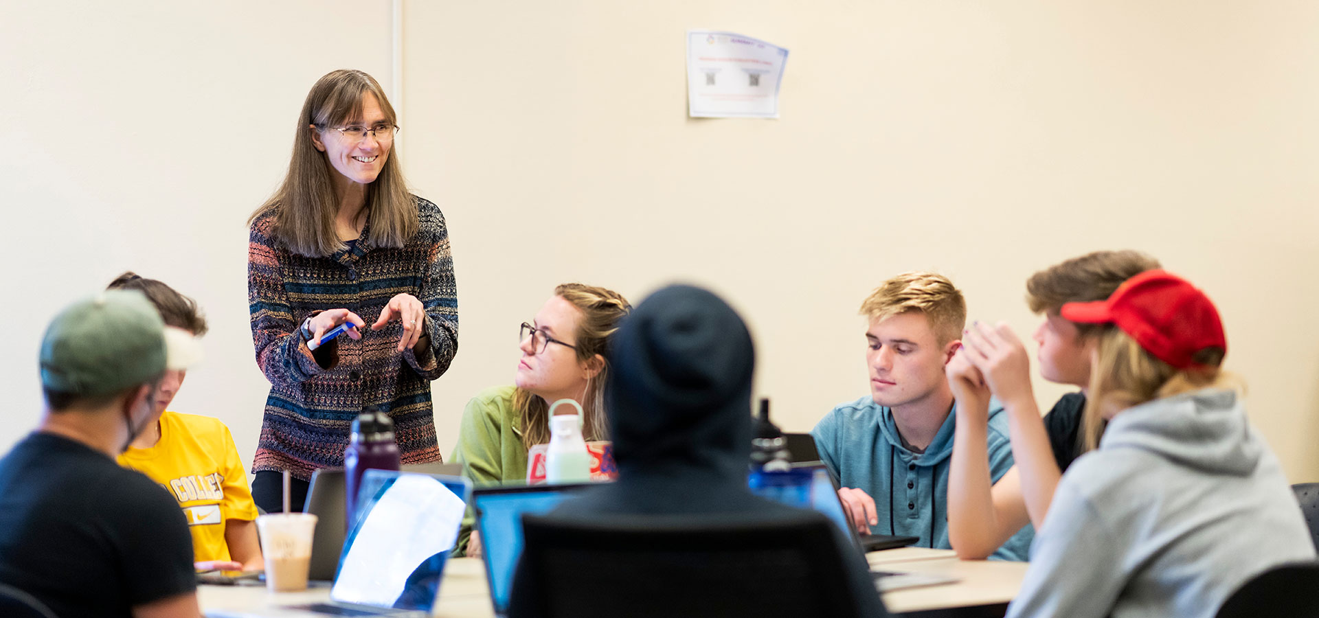 Students work as a group during Marion Hourdequin's Block 6 EV282 Contesting Climate Justice class on 3/15/23 where they debated climate policy. Photo by Lonnie Timmons III / Colorado College.