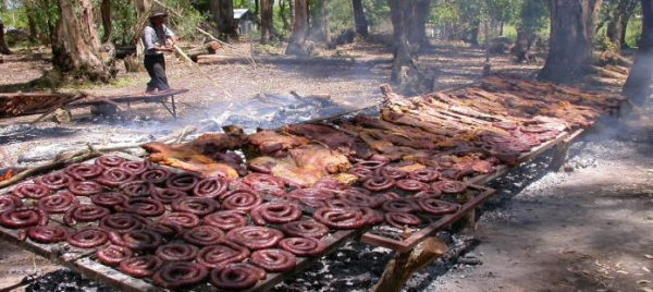 Image of meats being roasted.