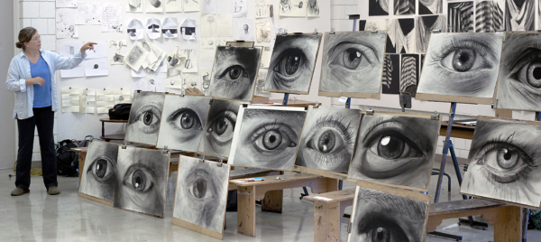 Photo of Kate Leonard instructing drawing class