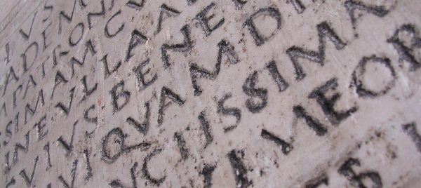 Photo of Latin carved into stone