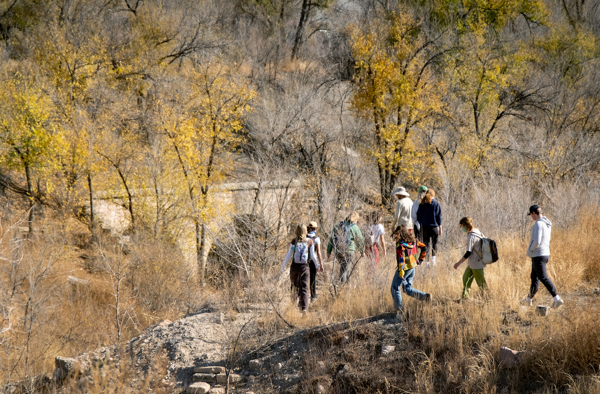 Students walking around an abandoned urban park area