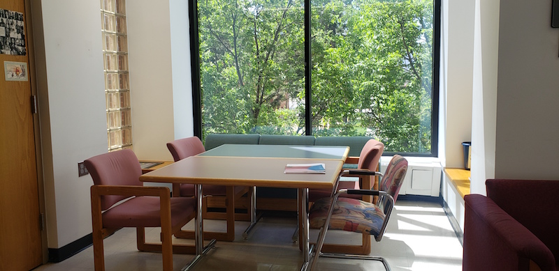 An open workspace with couches, chairs, and tables near the department office (302) <span class="cc-gallery-credit"></span>
