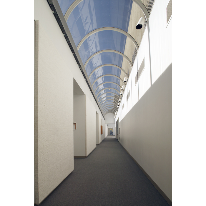 View down the vaulted barrel hallway in Packard <span class="cc-gallery-credit"></span>