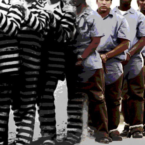inmates shown in prison garb