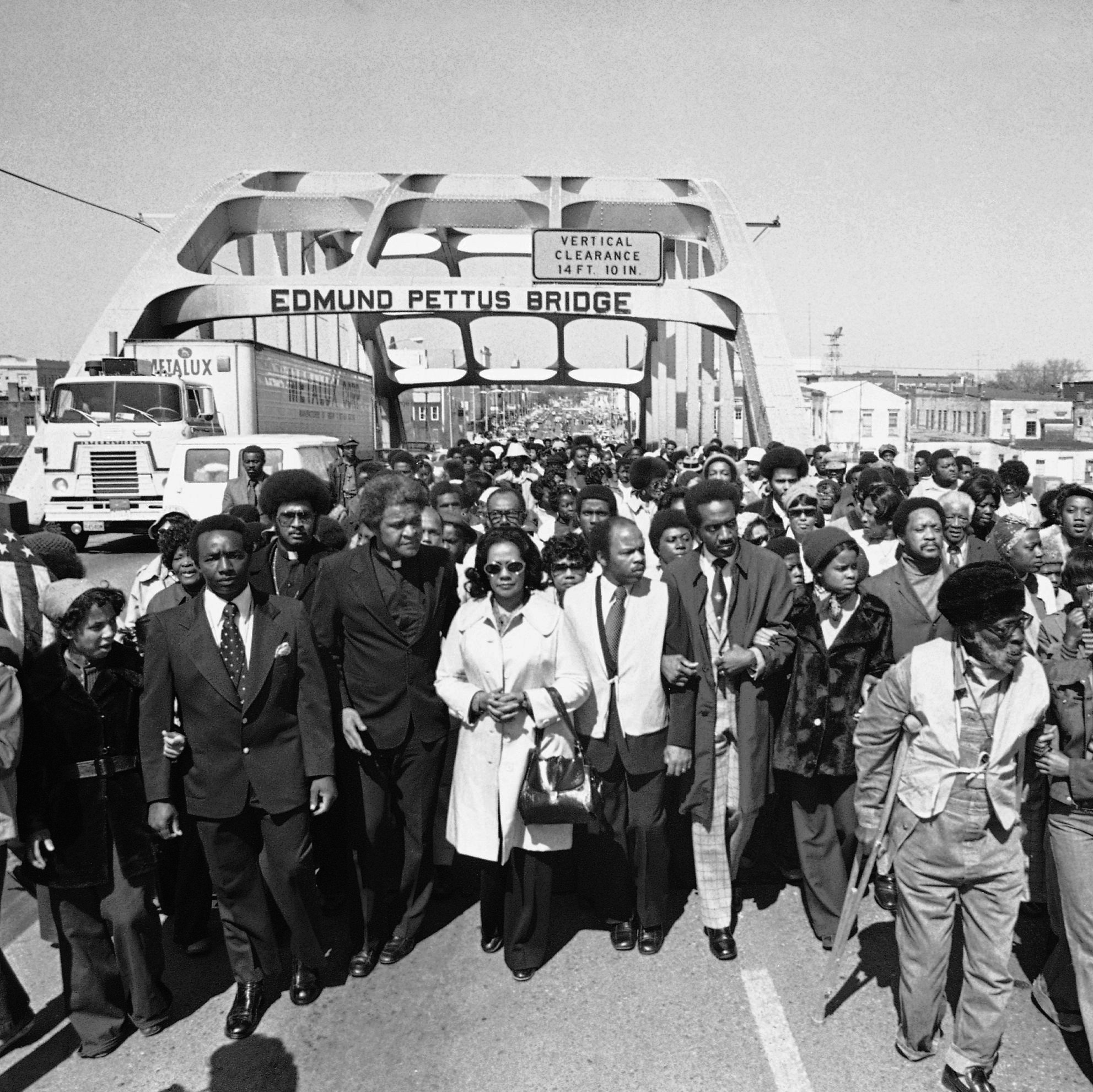 John Lewis and Martian Luther King Jr Lead the Salam March over Montgomery Bridge
