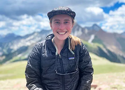 Leah with mountains in the background