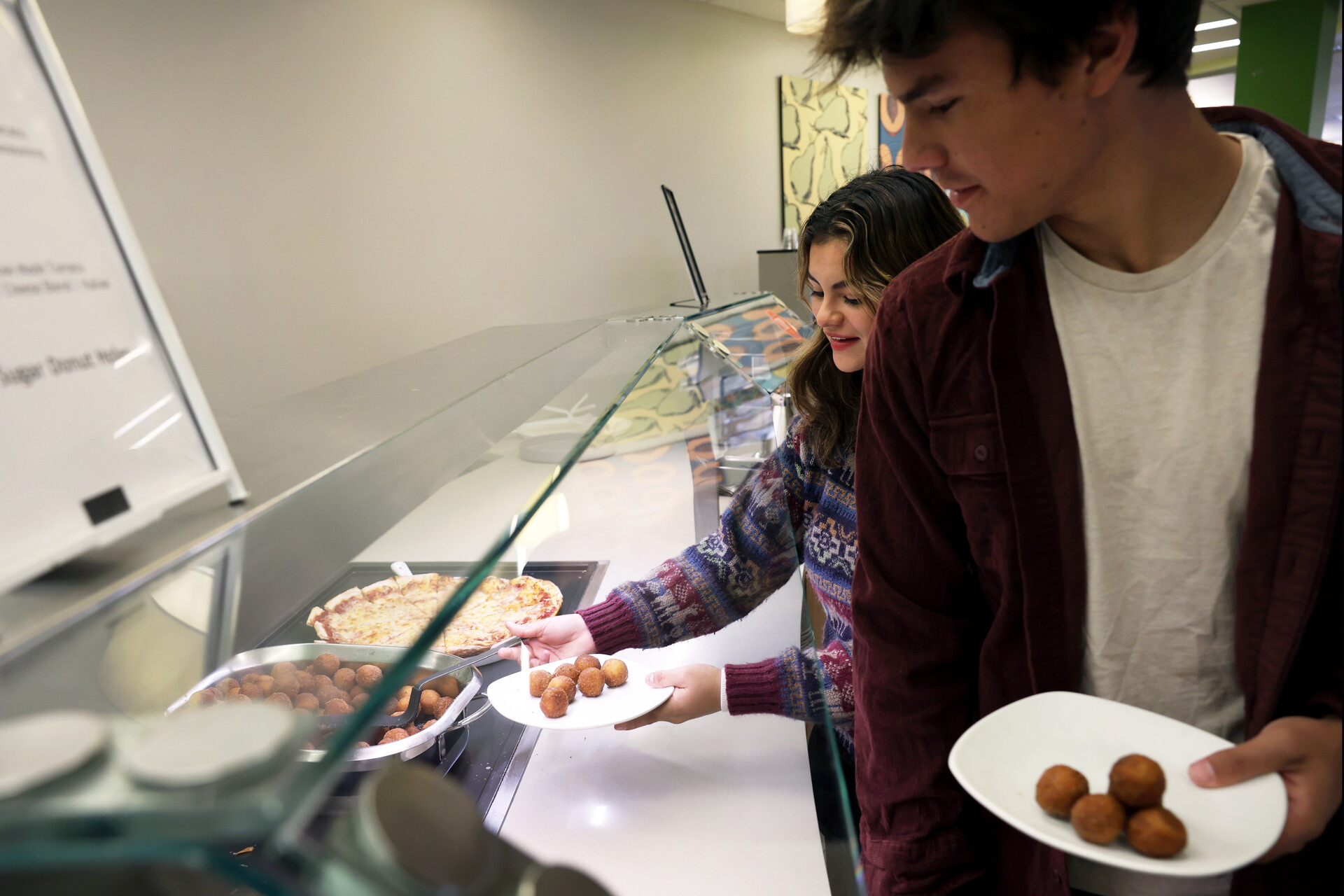 Students helping themselves to buffet-style food in our main dining hall