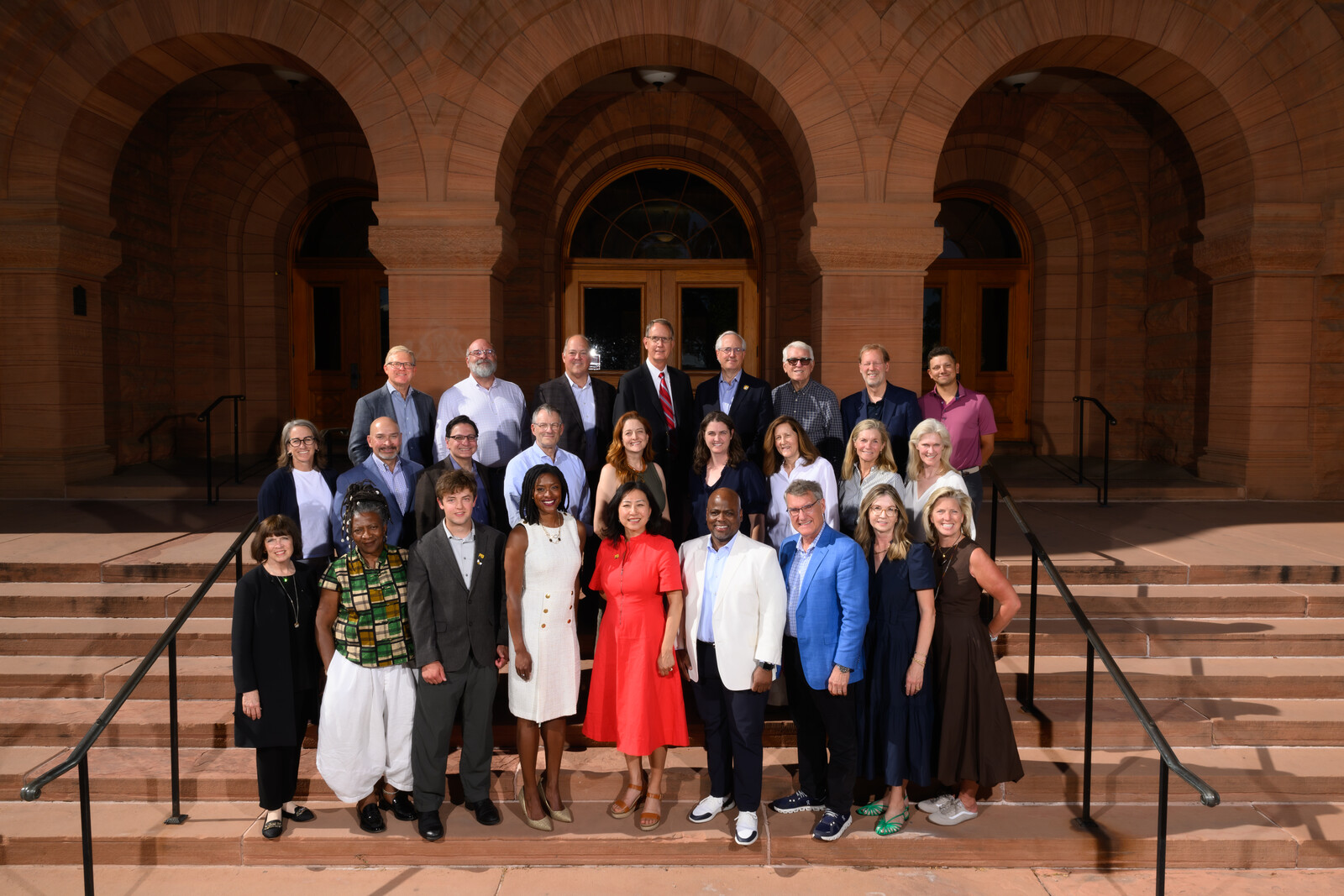 Group picture of the Board of Trustees in front of Palmer Hall