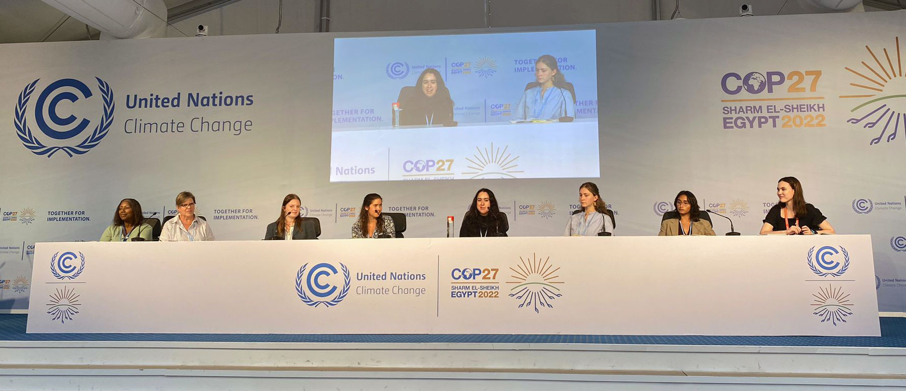 Myra Jackson, Sarah Hautzinger, Gracie Roe '25, Cecilia Timberg '24, Mary Andrews ' 23, and Mika Alexander '23 in a press conference with CSU and Monash University students at COP 27. Photo taken by Reeve Schroeder '24 and submitted by Mika Alexander '23.