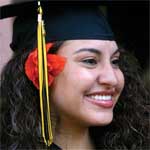 A happy <strong>Marnita Rodriguez '05</strong> surveys Armstrong quad.