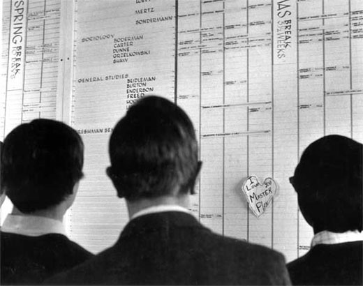 CC students study the 1970-71 class schedule on one of four 8-foot panels in Rastall Student Center.