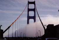Sea fog rolls over the Golden Gate Bridge, photo by John Day