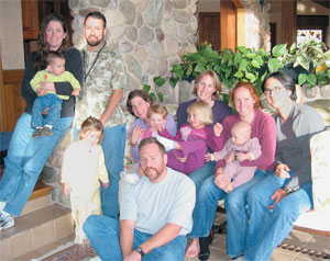 Friends gathered for a mini-reunion at <strong>Julie Berglund Fredericks’s ’93</strong> mother’s home in Steamboat Springs, Colo., to introduce their kids to each other. Back row, from left, <strong>Christy Cain Sanchez ’95</strong> (holding daughter Mia), <strong>Chris Sanchez ’94</strong>, Molly Stevens (holding son Cordley), Julie (holding Sage Stevens), <strong>Margaret Berglund ’96</strong> (holding nephew Zachary Fredericks), Chris Fredericks. Front row, from left, Anna Sanchez and <strong>Tyler Stevens '93</strong>.