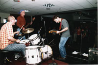 The first campus response was a fund-raiser at a January hockey game; fans donated $3,000 toward the relief effort. In February, CCCA, RISE (an anti-oppression student group), and the Renaissance Club sponsored a concert, above, featuring Livesounds bands, with proceeds going to Feed the Children. “We wanted to do a positive event with campus-wide support,” says the Renaissance Club’s <strong>Tyler Montgomery ’05</strong>.