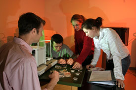 Back at the CC geology lab, students check out fossil finds from their field work.