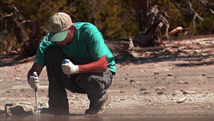 Garton captured Seth D’Imperio testing mineral-laden waters at Norris Geyser Basin.