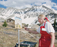 
Colorado and Arizona artist <strong>Darcie Swenarton Peet ’68 </strong>paints the mountains in Mayflower Gulch along Fremont Pass, Colo. Recent news from the artist includes a “Best of Show” award at the Rocky Mountain Plein Air Painters’ national, juried paint-out and exhibit in Jackson, Wyo.; and her entry into the prestigious “Top 100 Art for the Parks” national competition. Darcie’s painting, “Rich Cloak of Dawn Shadows,” was one of 100 selected for the final touring exhibit; the contest averages about 2,500 entries. 
		