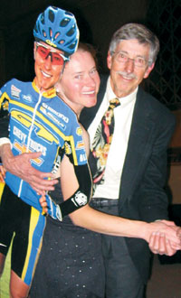 
<strong>Alison Dunlap ’91 </strong>and her cardboard doppelganger dance with father Robert Dunlap on Nov. 19 at a party held in honor of Alison’s retirement from competitive cycling. The event, held in Palmer Hall, raised nearly $1,900 for the Breast Cancer Fund.
		