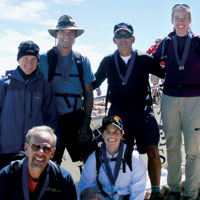 
<strong>Ian Hopper ’06 </strong>recruited Vice President for Advancement Steve Elder, who in turn recruited a CC team to participate in the Pikes Peak Challenge on Sept. 10, a fundraising event for the Brain Injury Association of Colorado. Steve reported, “As we climbed, we watched a herd of bighorn sheep skip down through the boulder field. At the top, we got a big hug from <strong>Alison Dunlap ’91</strong>. It made the long day’s climb worth it!” The group atop the Peak — top row from left, honorary Challenge chairperson Dunlap, Elder, Tom Suddes, and development officer <strong>Shelly Killeen ’97</strong>; kneeling, development officers <strong>Ron Rubin ’73 </strong>and <strong>Rachelle Latimer ’93 </strong>— raised more than $1,200 for brain injury prevention and treatment.
		