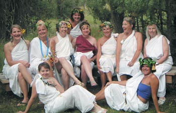 Lovely ladies pose in a serene setting at the Baca. Participants in the Baca Mini-Blocka (men included) immersed themselves in Olympic lore and literature, wrote and performed odes to modern athletes, and competed in grueling athletic events like the pool-noodle “javelin” toss.