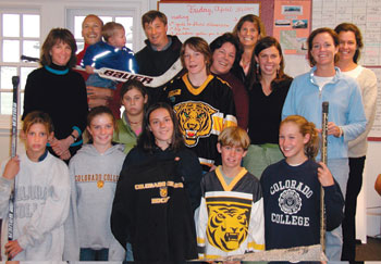 This large CC family enjoys the common connection they have at Stanley British Primary School in Denver. Back row, from left, <strong>Cathy Pfeiffer Emery 82, Jon Gottesfeld 92</strong> with son Ely, <strong>Ted McLean 90</strong>, J.J. Westcott, <strong>Jamie English Westcott 82, Molly Brown Hamilton 81, Molly Higginbottom 01, Emma Gardner Griffith 88</strong>, and <strong>Joanna Hambidge 86</strong>. Front row, from left, Kate Hamilton, Elle Emery, Annie Hamilton, Claire Westcott, Griff Griffith, and Gracie Griffith. Not pictured, but also found at Stanley: <strong>Diana Poole 79</strong> and her children Zach, Sam, and Sarah; J.P. Griffith; <strong>Maria Barsallo 07; and David White 08</strong>. 