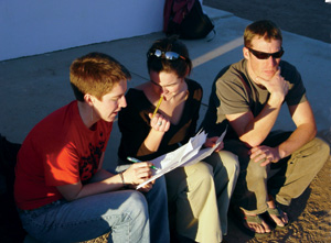 <strong>Virginia Weeks 05</strong>, <strong>Margaret Lamb 05</strong>, and <strong>Eddie Konold 07</strong> pause in Nogales, Mexico, to reflect on the weeks observations of Mexican migrants and the results of their movement.