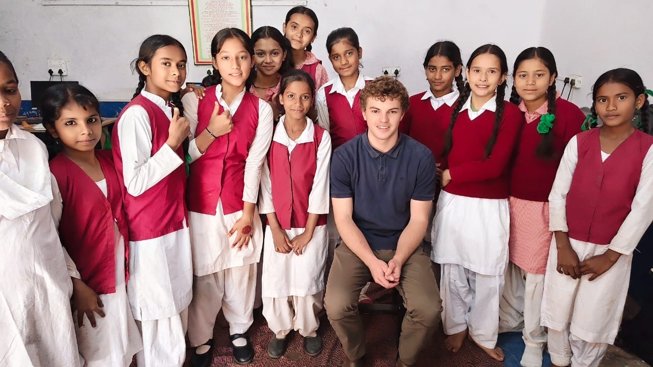 Ben Murphy ’24 with students from Arya Kanya Kotdwar School in November 2025 as part of his work with SAHELI. Photo provided by Murphy.