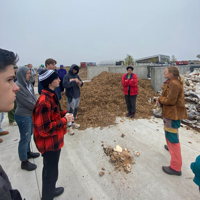 Students in Jillian Jaeger's Environmental Social Science course took a field trip to Food to Power, a local organization that works to make food more accessible within the Colorado Springs community. Photo submitted by Noah Furuseth &amp;#8217;26.