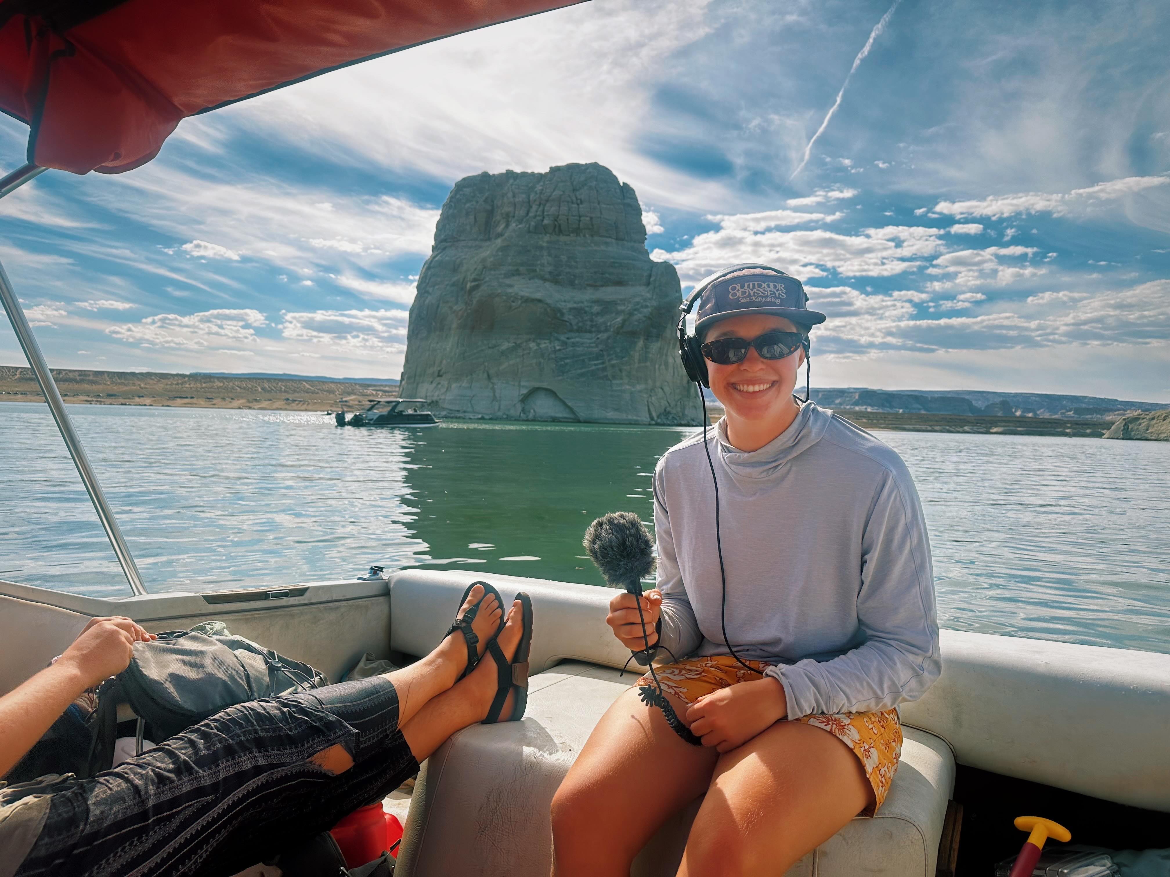 Evelyn Baher-Murphy ’25 interviews Shannon Herbst at Lone Rock in Wahweap Bay, Lake Powell in October 2024. Photo provided by Baher-Murphy.
