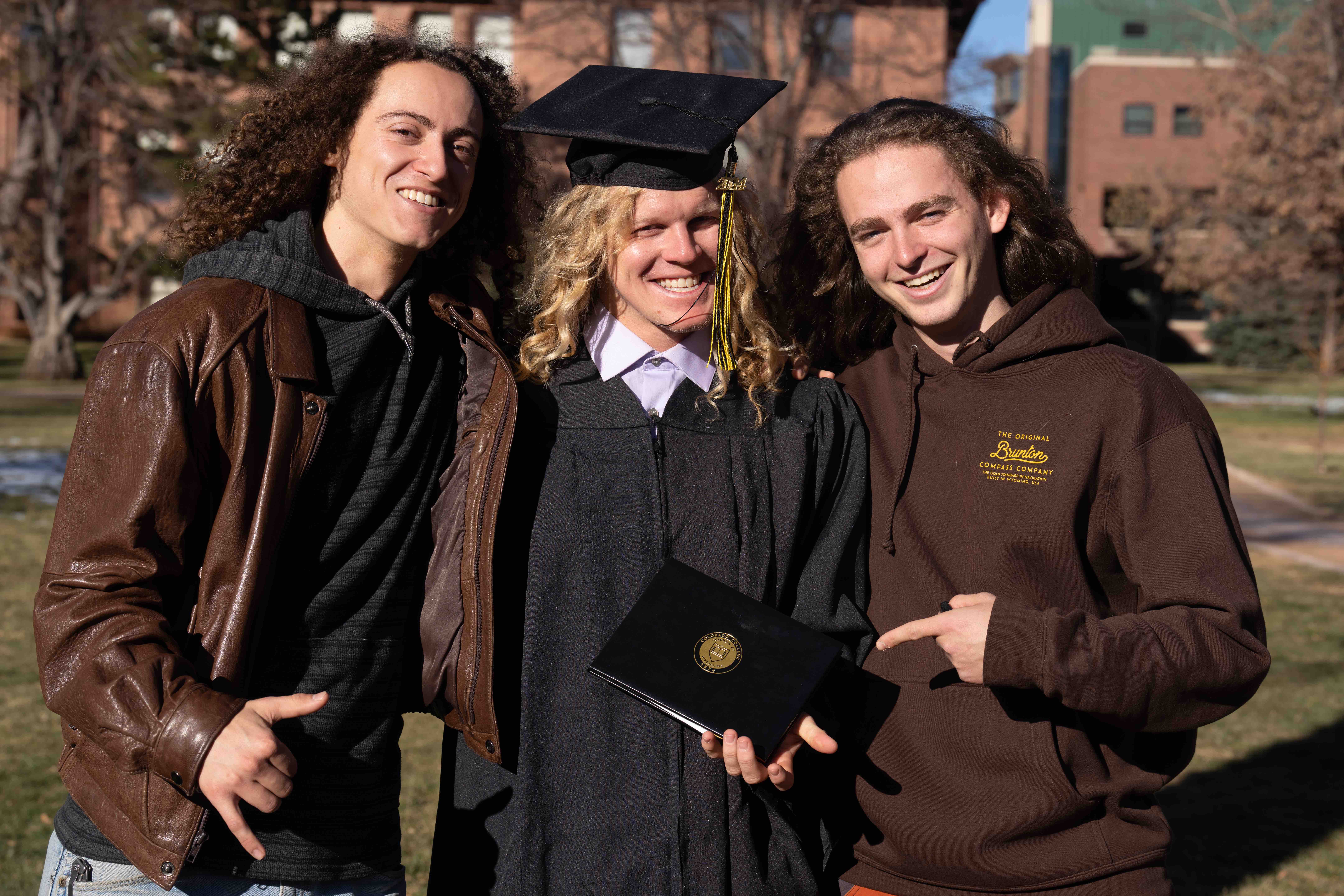 Friends celebrate the newly graduated CC student at Winter Commencement.