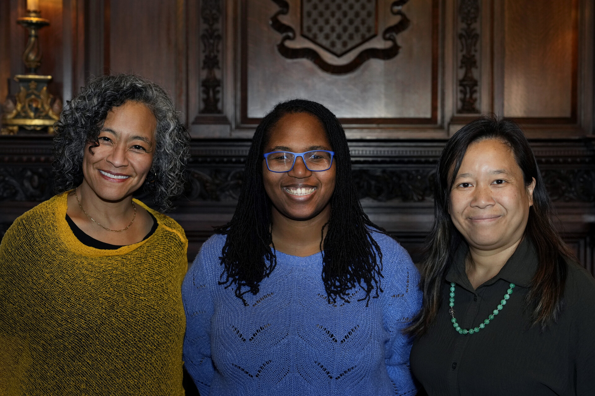 President L. Song Richardson, newly-tenured faculty member Jessica Kisunzu, and Dean Emily Chan at a celebratory dinner on April 11 at Stewart House.  Photo by Jamie Cotten / Colorado College
