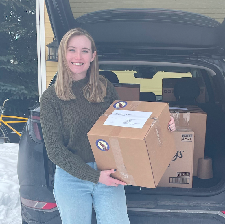  Mackenzie Boyd &amp;#8217;24 packs supplies for Project: Distributing Dignity 