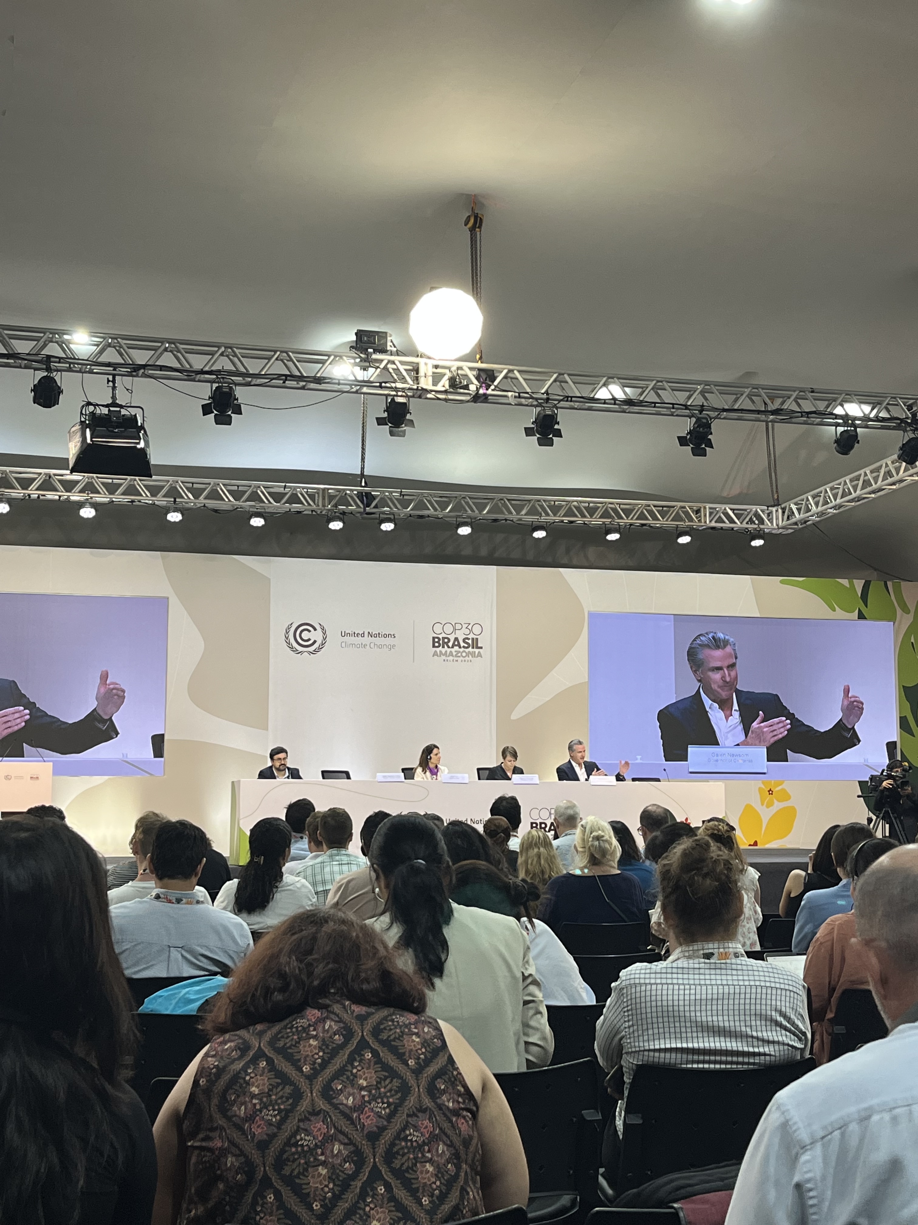 A plenary session during COP30 in Belém, Brazil, in November 2025, showing California Governor Gavin Newsome on the screen. Photo provided by Noah Furuseth '26.