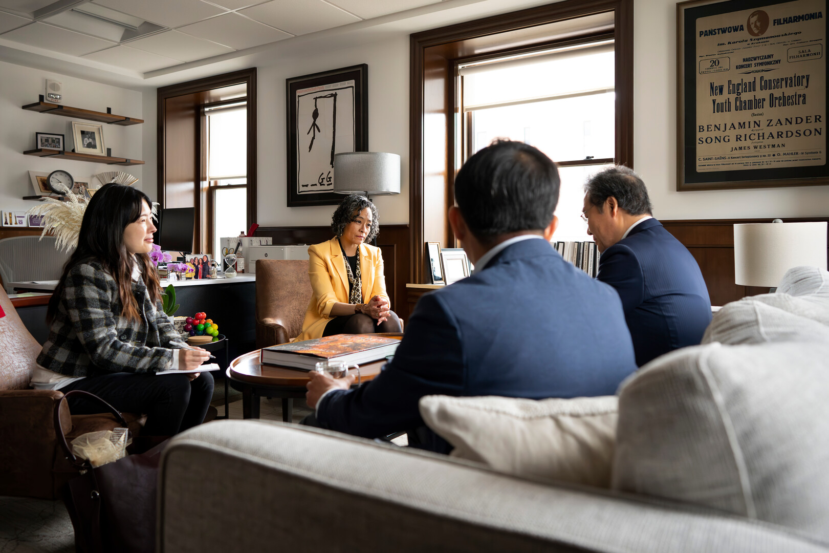 Political Science Professor Jiun Bang, President L. Song Richardson, former Prime Minister Nakyon Lee, and a visiting professor from CU Boulder meet in the president's office for an official welcome. Photo by Lonnie Timmons III