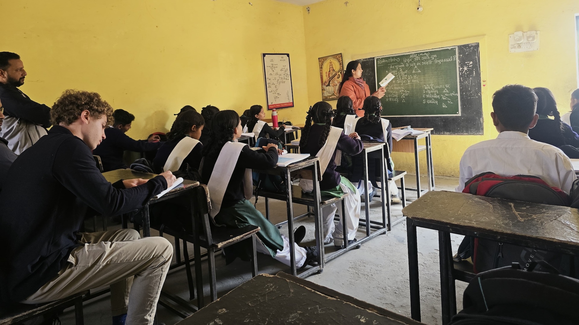 Ben Murphy ’24 observing a remedial learning session with students from GGIC Ghamandpur in December 2025 during his work with SAHELI. Photo provided by Murphy.