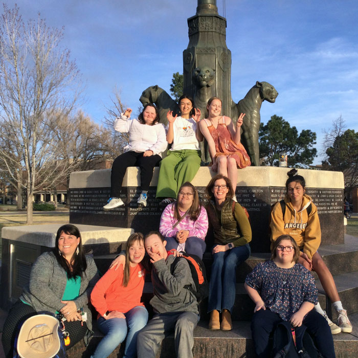 Members of the Higher Visions for Education program, which partners with the CC Best Buddies organization, are pictured after participating in a photo scavenger hunt around campus, where they worked on learning technology using iPads. Photograph taken by a Best Buddies student on April 20, 2022.