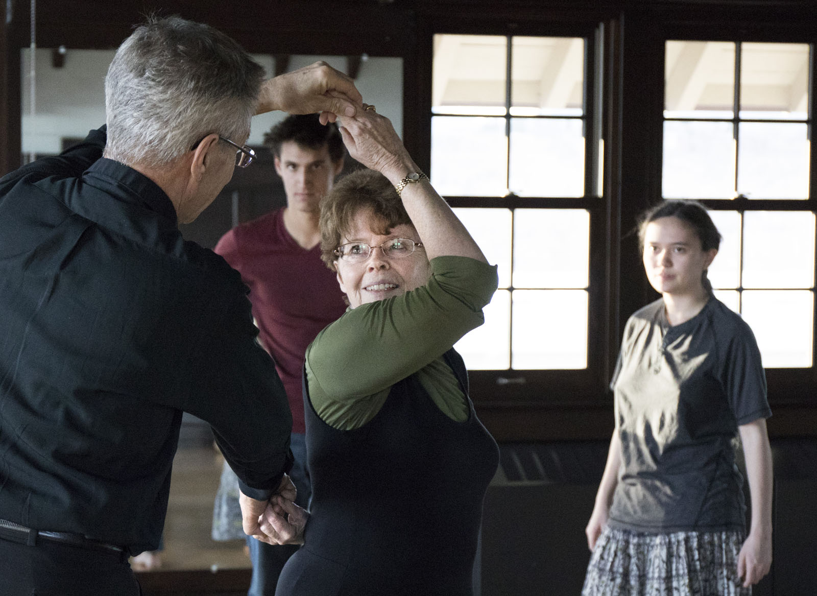 Marcia Dobson and John Riker teach a ballroom dancing class in Cossitt Hall that is open to students and staff alike. The class focuses on dance techniques for various dance styles. Soren Kodak '21 and Greta Wu '19 watch a technique being demonstrated.