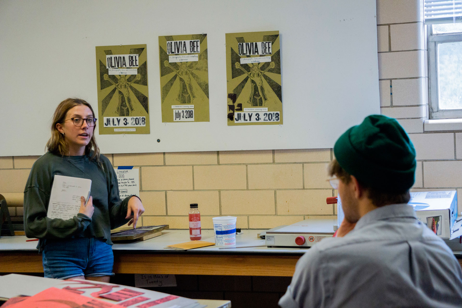 Linnie Cole ’20 presents her ideas for a print while classmate Charlie Szur ’20 listens on, intently. Photo by <strong>Noah Smith &rsquo;20</strong>