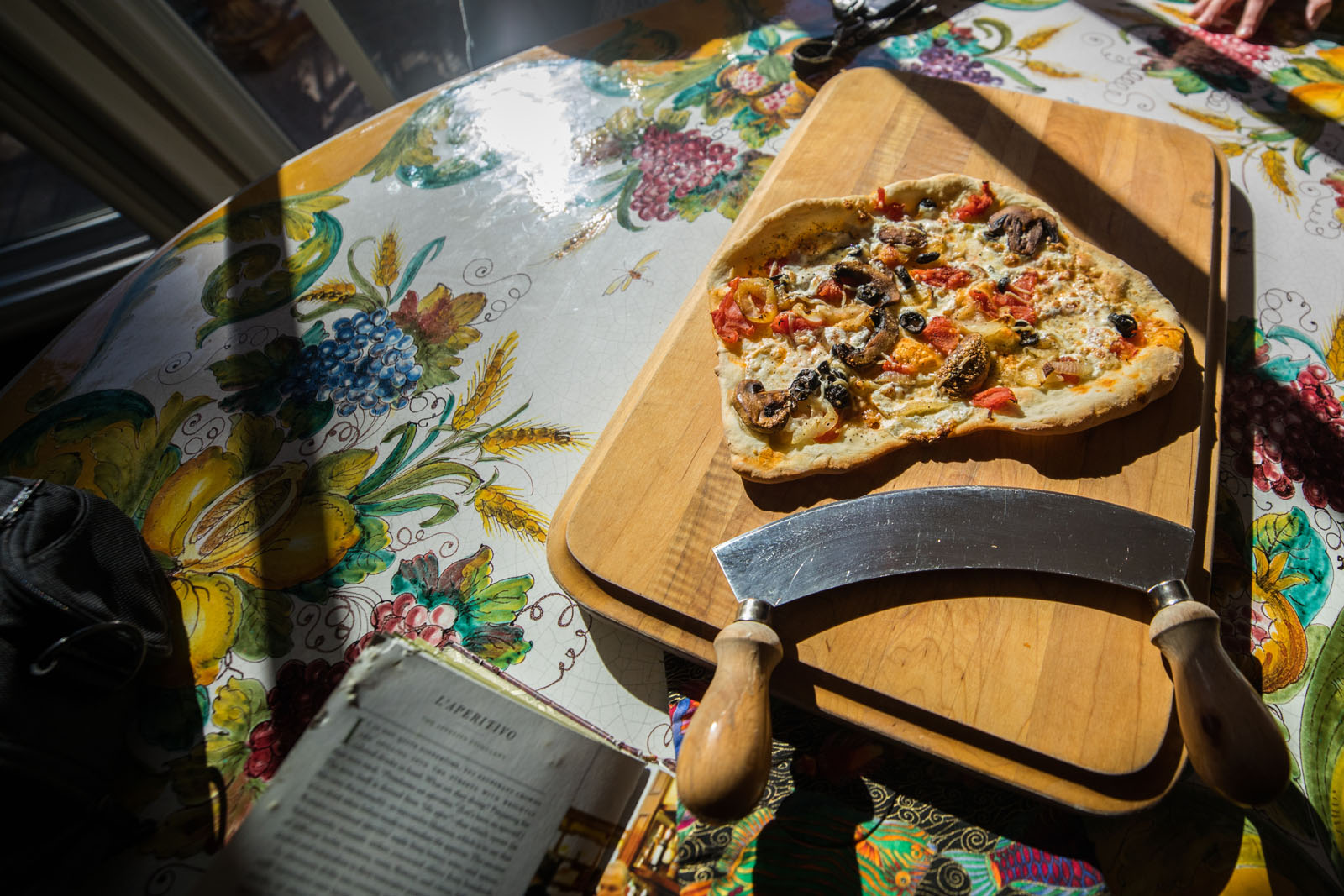 Students in Elementary Italian make homemade pizza at Professor Dario Sponchiado’s friend's home.