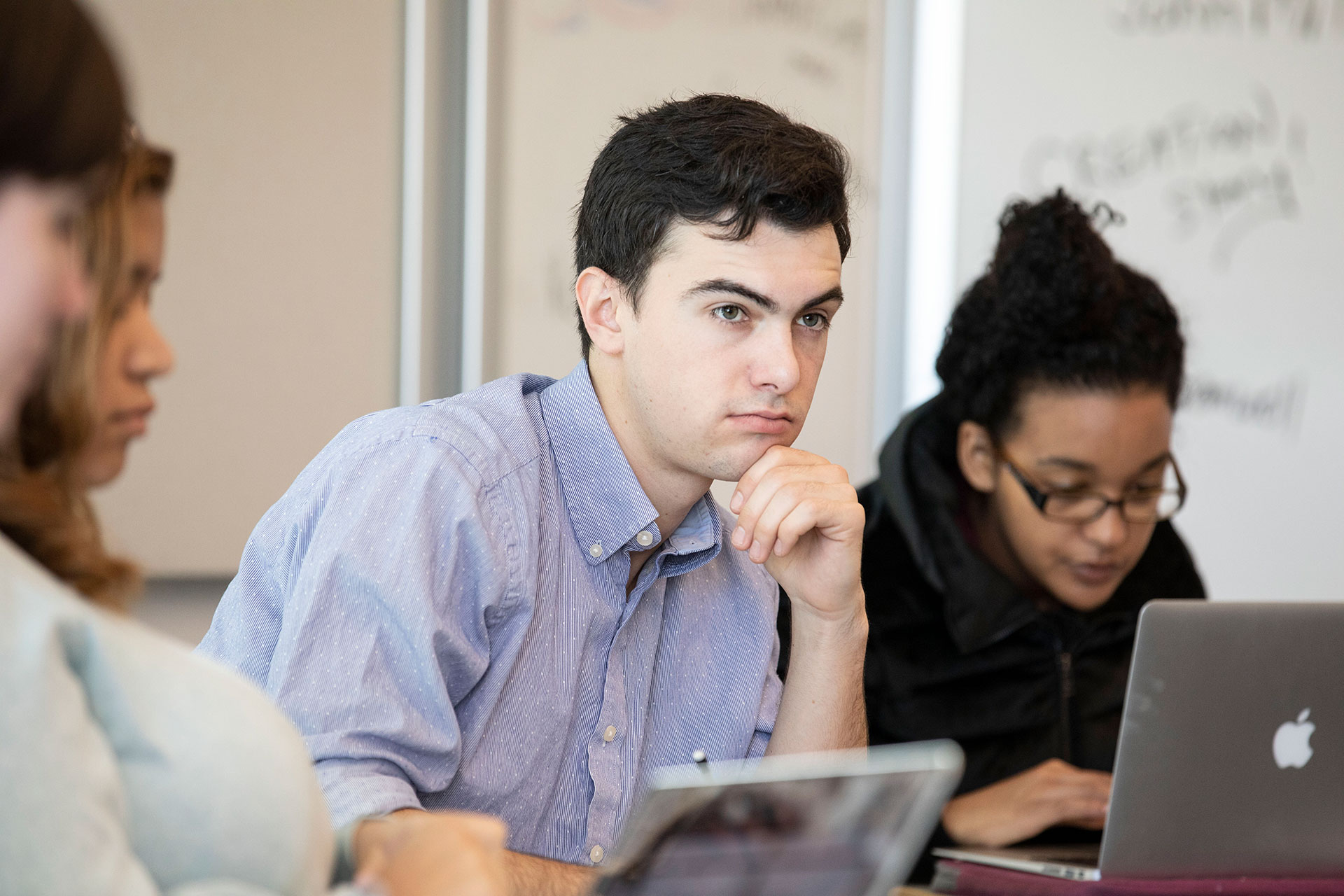 <b>Jonah Baca ’19</b> listens as a classmate discusses a description of Satan from Paradise Lost. Jared Richman’s class Frankenstein at 200 is investigating not just Mary Shelley’s classic but its influences and contemporaries such as this day’s discussion of Paradise Lost by John Milton.