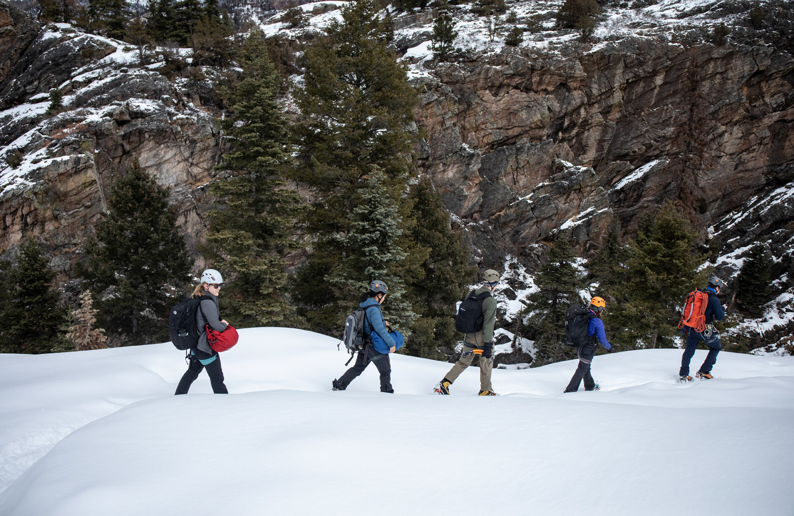 Trip Leader and Associate Director of Outdoor Education David Crye leads students along a trail in the Ouray Ice Park to get to an area where they can climb. Outdoor Education took students new to ice climbing to the Ouray Ice Park in Ouray, Colorado during a block break trip. The low-cost trip is designed for students who are new to ice climbing and might not otherwise be able to try out the sport due to the investment required to take lessons and purchase or rent equipment.