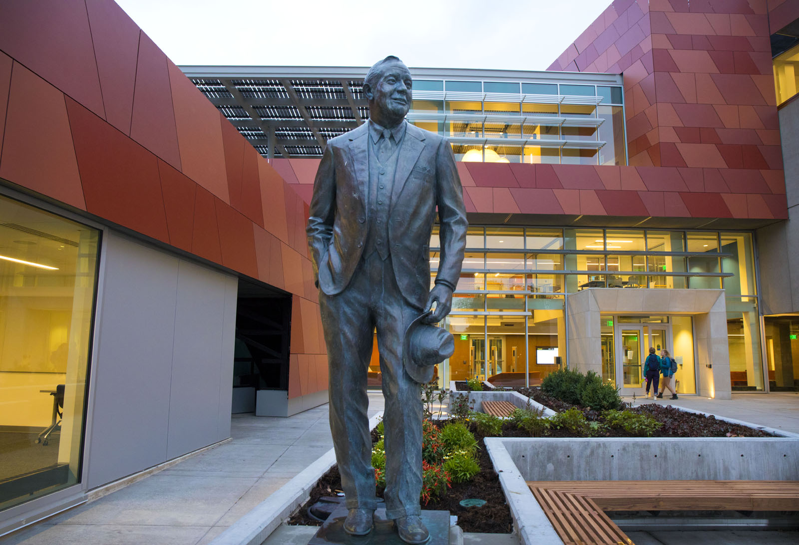 A statue of Charles Leaming Tutt Jr. greets visitors at the Tutt Library main entrance.