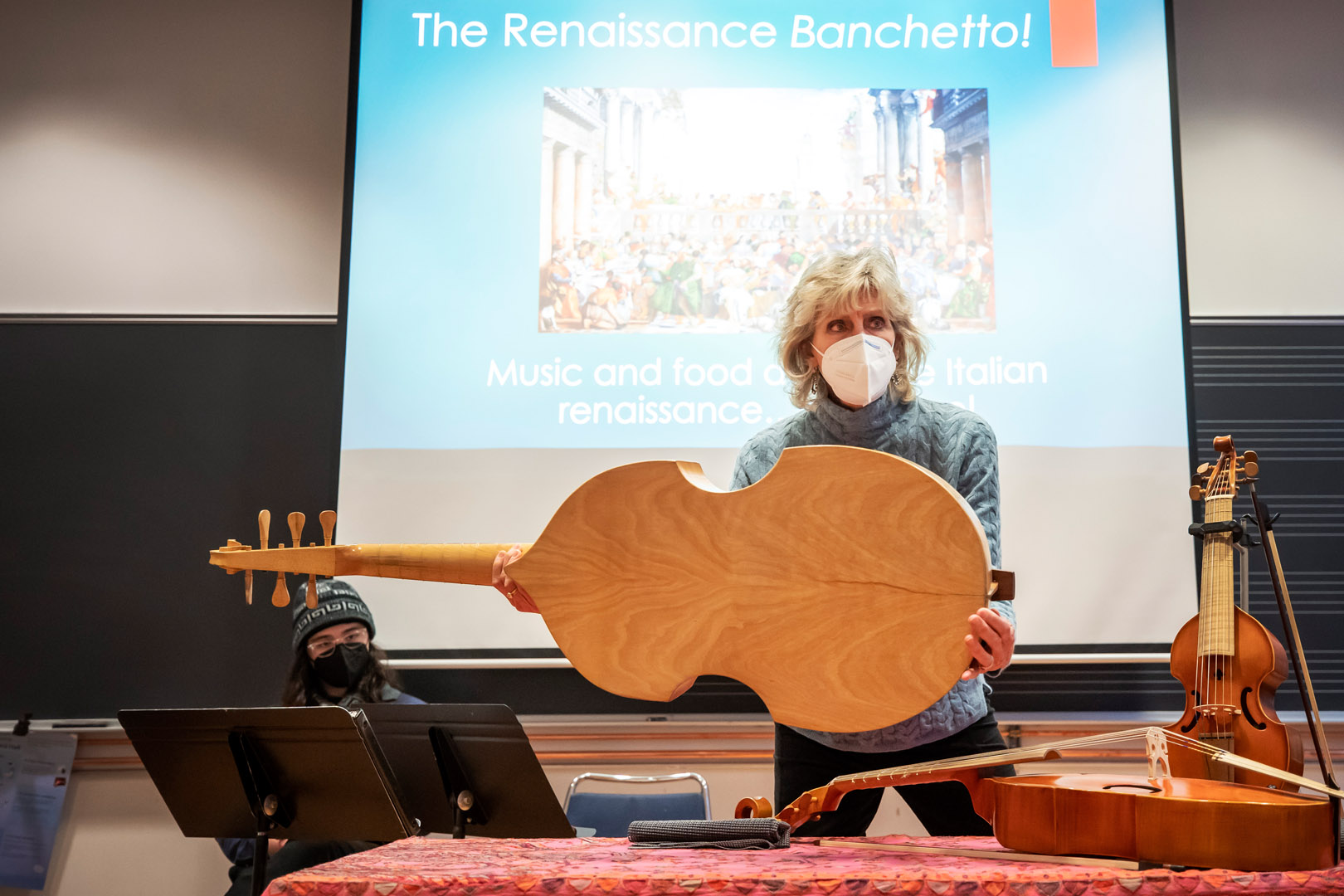 Professor Nancy Ekberg holds a bass viola da gamba. Photo by Lonnie Timmons III